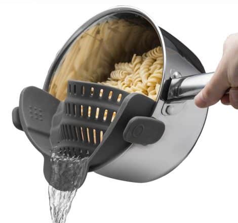 Must-Have Grey Kitchen Gadget: Snap N Strain, a Clip-On Strainer for Pasta, Pot Noodle, and more.