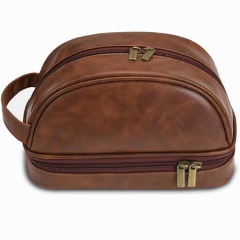 Customized travel-sized men’s toiletry bag: High-quality, trendy, and waterproof leather Dopp kit in reddish brown.