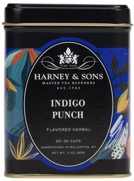 Indigo Punch Tea: A vibrant blend of butterfly pea flower, rose hips, apple pieces, and raspberry. (15 words)