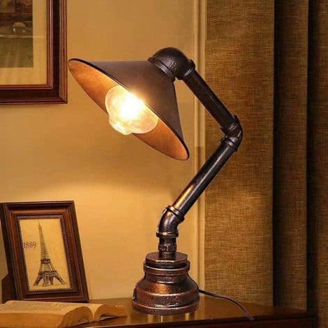 Steampunk-inspired table lamp with retro iron piping design, ideal for bedrooms, living rooms, kitchens, or cafes.