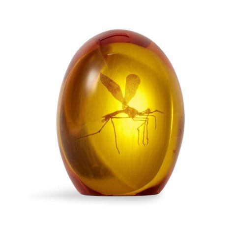 Official Jurassic Park collectible resin replica of a mosquito in amber paper weight, 3 inches tall.